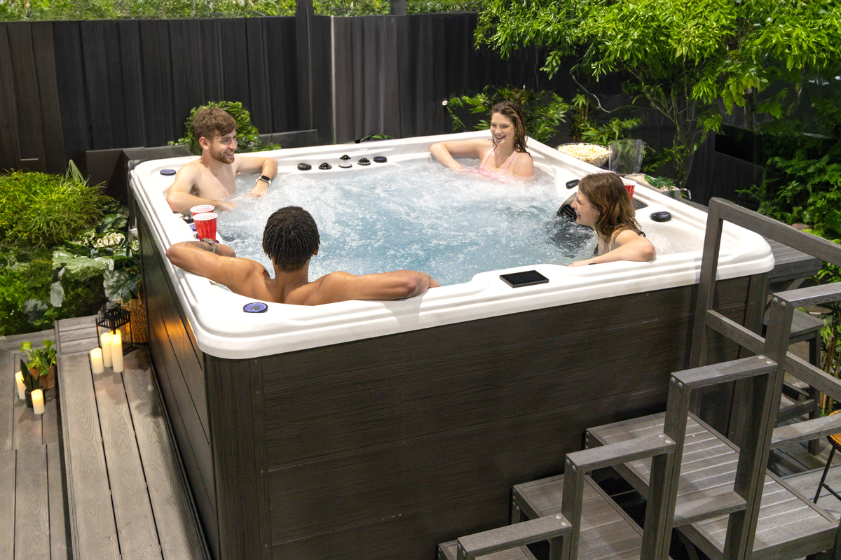 1O8A7215-1200×800-5b2df79 4 people using a hot tub